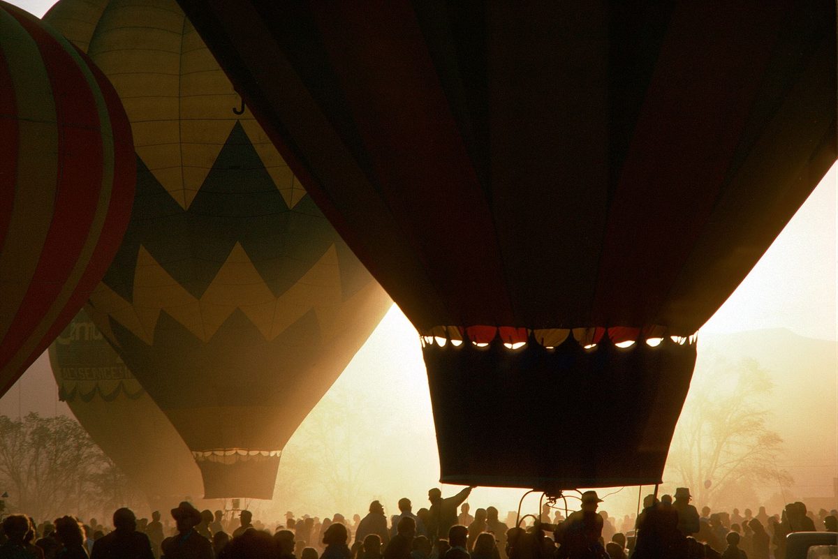 Hot air balloons silhouetted at the Albuquerque International Balloon Fiesta.
